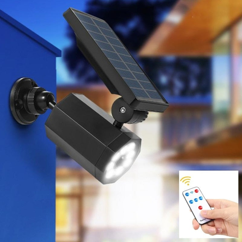 Lampa solara, tip camera video, cu senzor de miscare, lumina LED, telecomanda, acumulator, negru
