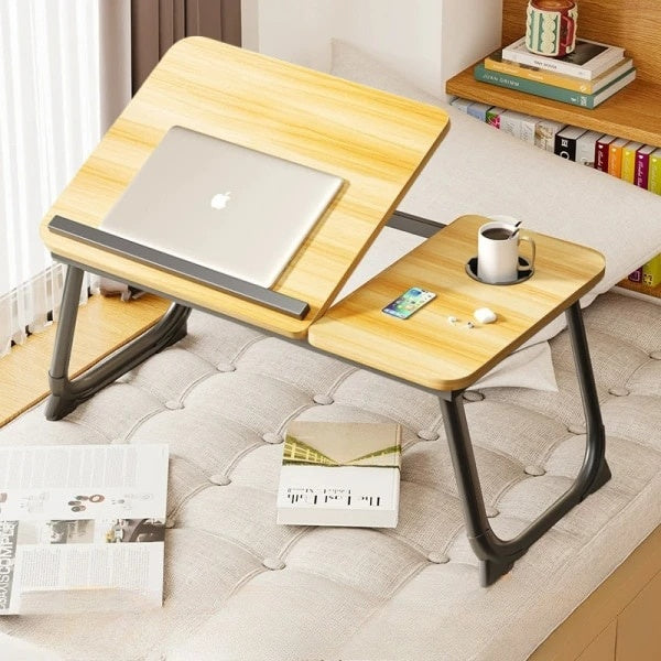 Masa pliabila pentru laptop, cu suport pentru pahar, reglabila pe inaltime 5 pozitii, dimensiuni 55.3 x 24 x 32 cm, greutatea maxima suportata 45 kg, lemn deschis