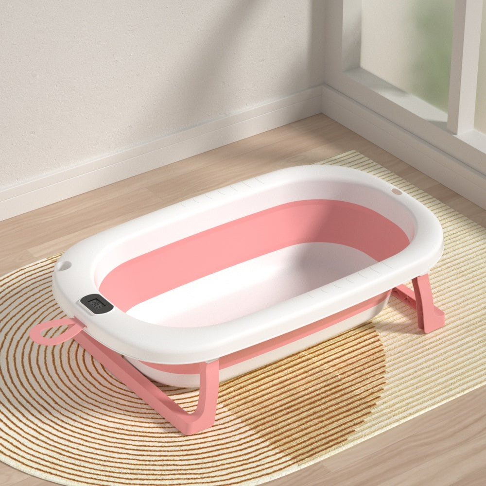Cadita pliabila pentru bebelusi, cu termometru digital, dop de scurgere, picioare anti-alunecare, design ergonomic, fara BPA, alb/roz