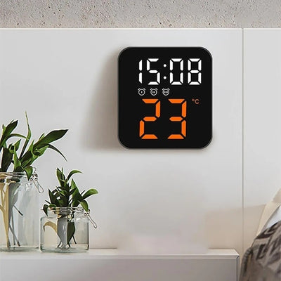 Ceas de masa, cu lumina led portocaliu, incarcare USB, alarme, calendar, temperatura, functie snooze, mod de noapte, dimensiuni 11 X 10 X 4 cm, negru/portocaliu