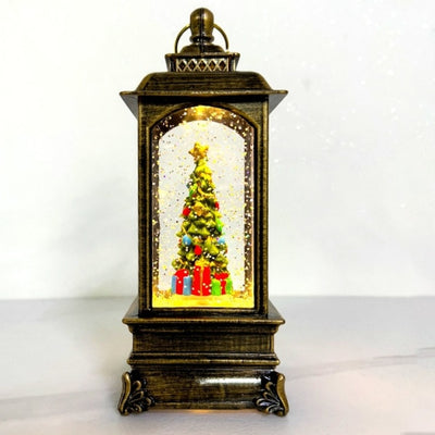 Decoratiune luminoasa si muzicala cu tematica de Craciun, tip felinar, cu brad impodobit si cadouri, din metal si plastic, maro