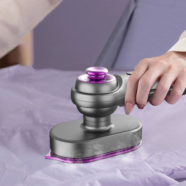Fier de calcat portabil, calcat uscat si cu abur, maner rotativ 360°, rezervor de apa cu capacitate mare, compact si usor de folosit, mov