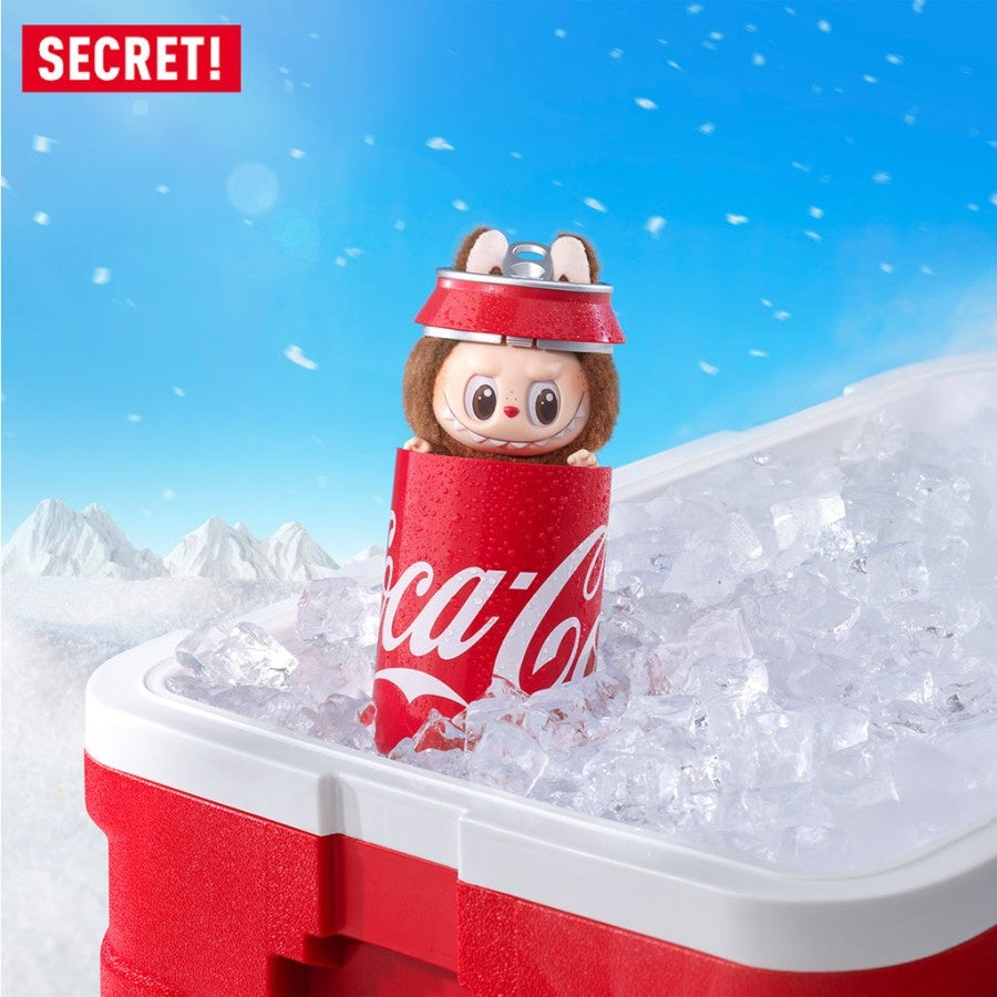 Figurina LaBubu in cutie CocaCola, de plus, moale si pufoasa, maro, 25 cm