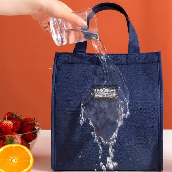 Geanta termoizolanta pentru pranz, pliabila, dimensiuni 34 x 26 x 16 cm, din material taxtil cu folie de aluminiu pe interior, impermeabila, albastru