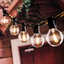 Ghirlandă luminoasă decorativă, globuri G50, 10 becuri, 10 m, alb cald / multicoloră – imagine 1