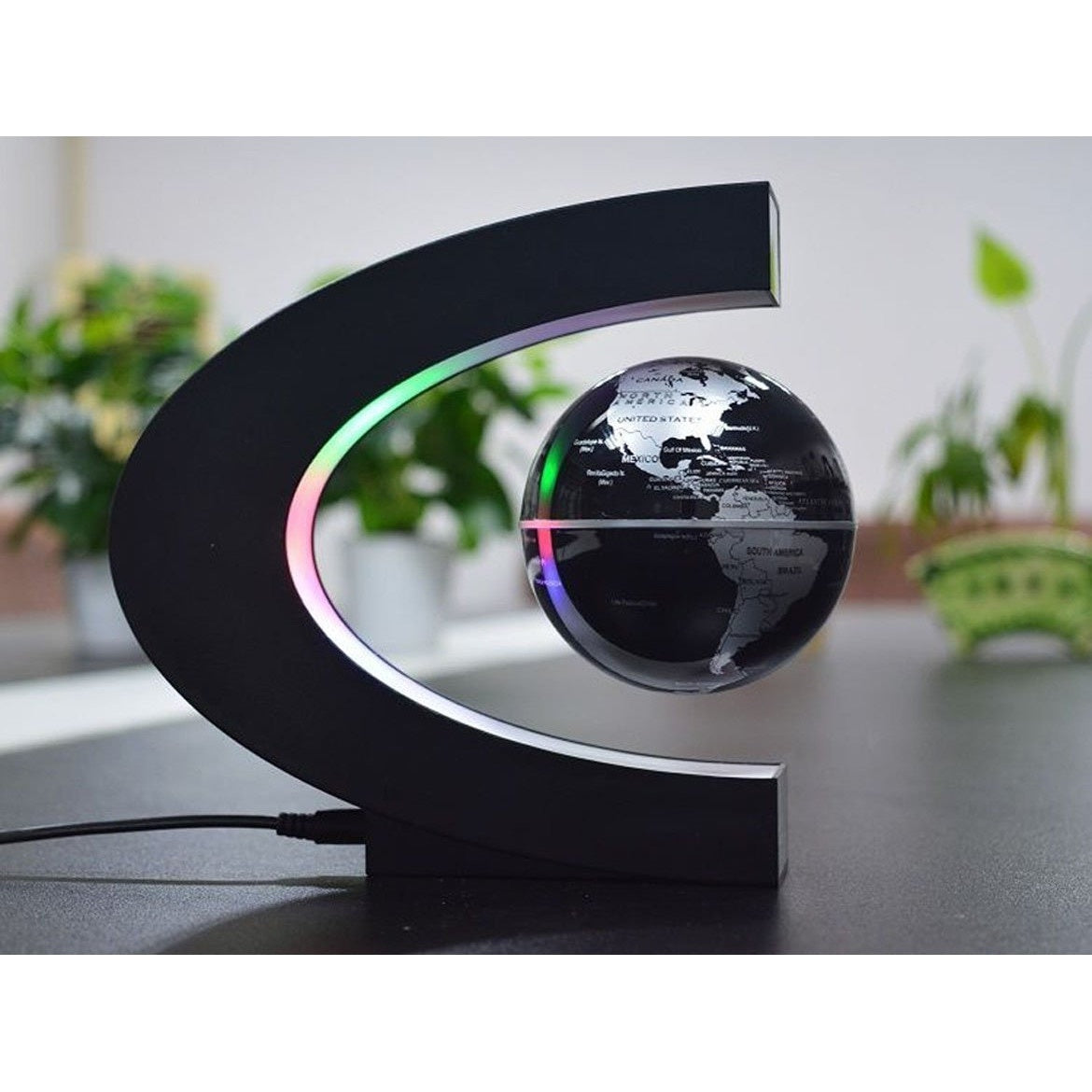 Glob magnetic, plutitor cu suport luminos