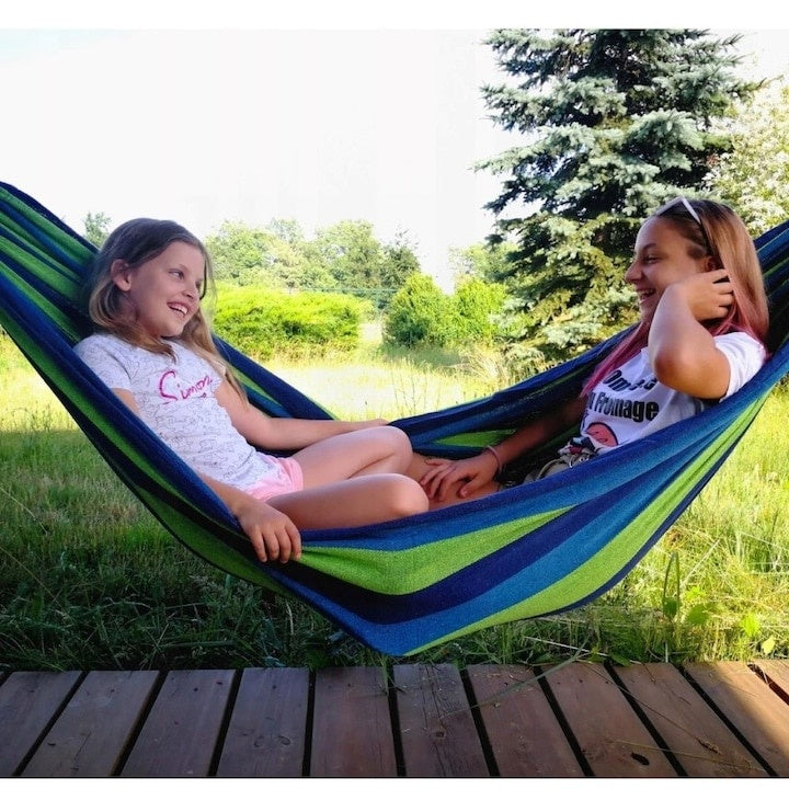 Hamac din bumbac, pentru relaxare, dimensiuni 180 x 80 cm, cu bara de lemn, greutate maxima suportata 150kg, verde/albastru