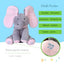 Jucarie interactiva elefant, FOXMAG24, peek a boo, canta si vorbeste, 30x15 cm, gri/roz