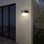 Lampa LED de perete rotunda cu incarcare solara, design compact si senzor de lumina