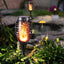 Lampa solara de gradina, tip torta, cu efect de flacara, lumina calda, rezistnta la apa si intemperii, din ABS, negru