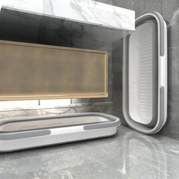 Lighean pliabil dreptunghiular, portabil, capacitate 8 L, dimensiuni 56 x 25.5 x 17 cm, cu 4 rotile mici pentru transport, usor de depozitat si curatat, alb/gri