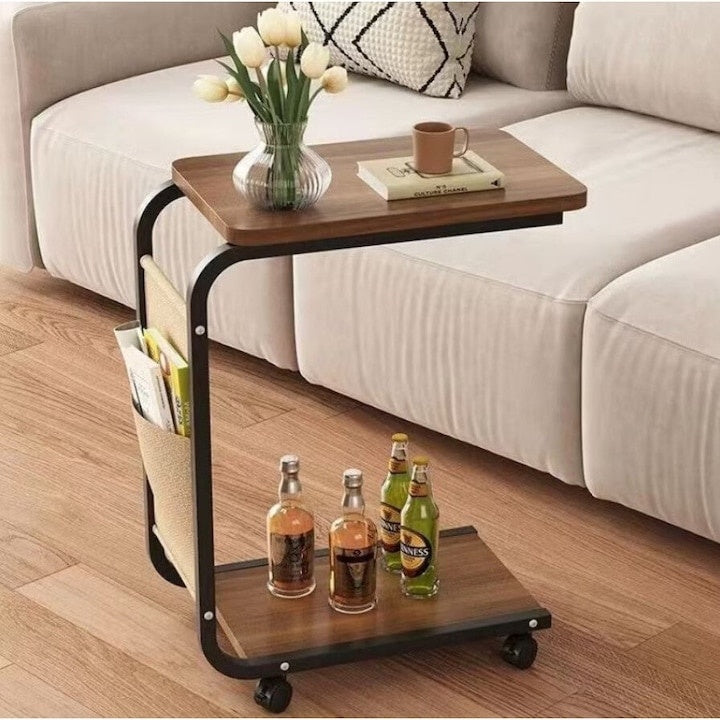 Masa de cafea, cu 2 polite si buzunar lateral, din lemn si metal, cu roti pentru transport usor, dimensiuni 65 X 30 cm, maro/negru