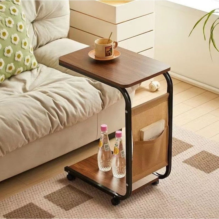 Masa de cafea, cu 2 polite si buzunar lateral, din lemn si metal, cu roti pentru transport usor, dimensiuni 65 X 30 cm, maro/negru