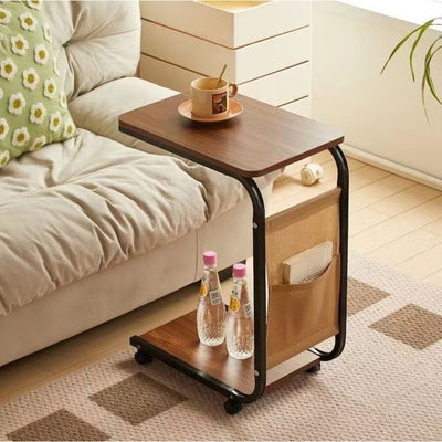 Masa de cafea, cu 2 polite si buzunar lateral, din lemn si metal, cu roti pentru transport usor, dimensiuni 65 X 30 cm, maro/negru