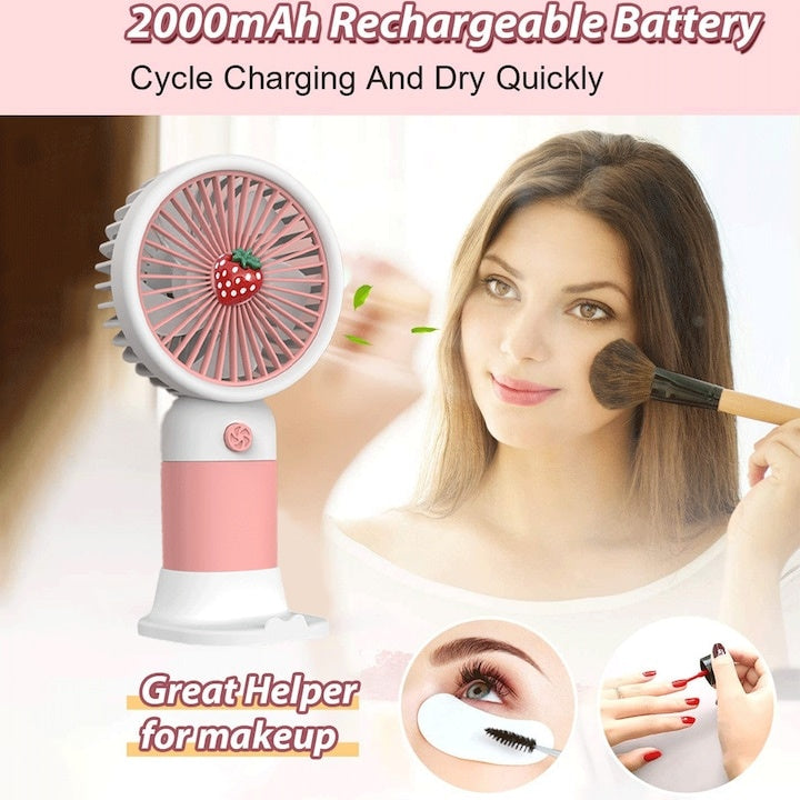 Mini ventilator portabil, capsuna, alimentat cu baterie reincarcabila USB, cu suport pentru telefon, buton ON/OFF, 3 viteze, roz/alb
