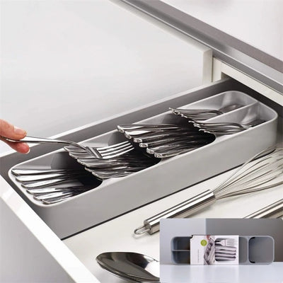 Organizator pentru tacamuri, cu 5 compartimente, dimensiuni 39.8 cm x 11.4 cm x 5.8 cm, nu ocupa mult spatiu, alb