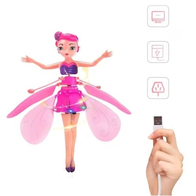 Papusa FOXMAG24, zana zburatorare, cu control interactiv al mainii, dimensiuni 19x6.5cm, baterie reincarcabila, roz