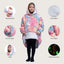 Patura cu maneci, tip hanorac lung, pentru copii/adulti, cu imprimeu FLUORESCENT, din fleece captusit cu blana, cu buzunare, mansete si gluga, roz