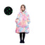 Patura cu maneci, tip hanorac lung, pentru copii/adulti, cu imprimeu FLUORESCENT, din fleece captusit cu blana, cu buzunare, mansete si gluga, roz