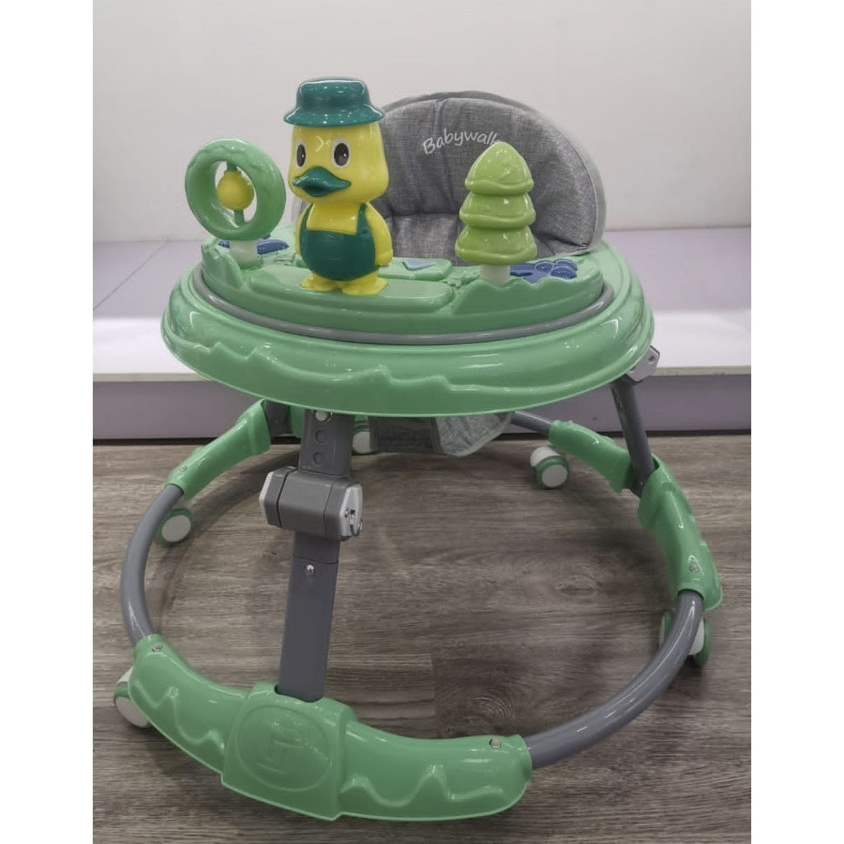 Premergator pentru bebelusi, cu baza rotunda, jucarii zornaitoare, reglabil in inaltime, husa de scaun detasabila, usor de spalat, verde