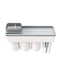 Suport pentr 6 periute de dinti, cu 3 pahare si suport telefon mobil, magnetic, din plastic, alb/gri