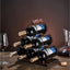 Suport pentru 6 sticle de vin, cu design modern, din lemn natural si otel, dimensiuni 32,5x16x30 cm, maro