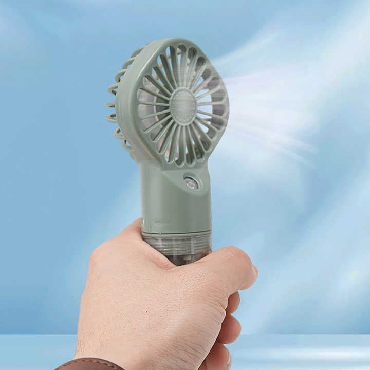 Ventilator portabil de mana, cu vapori de apa, 4 trepte de viteza, ideal pentru calatorii, din plastic, verde